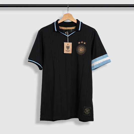 Polo Sol GOAT Captain Black FootballTown Color Negro